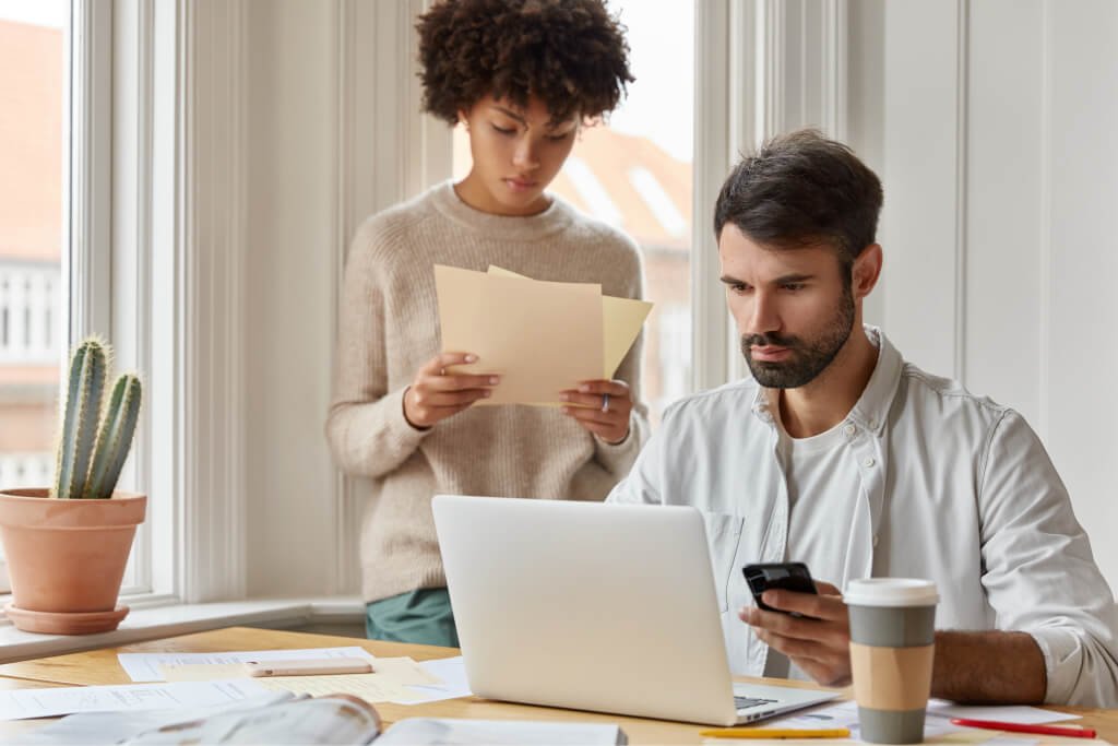 Diverse team of employees have informal meeting at 01.jpg